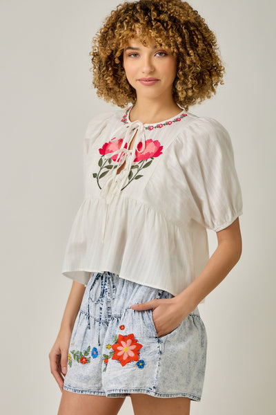 FLORAL EMBROIDERED PEPLUM BLOUSE