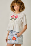 FLORAL EMBROIDERED PEPLUM BLOUSE